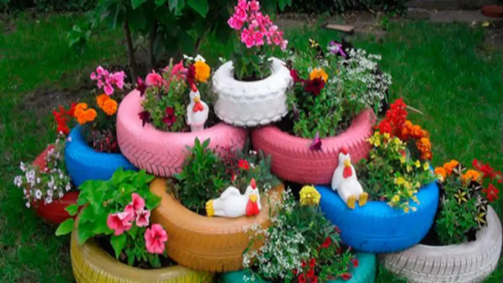 Paisagismo grátis no quintal usando peneus. Dicas no blog Conversa Pronta.